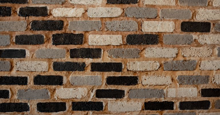 brick wall with grey and black bricks